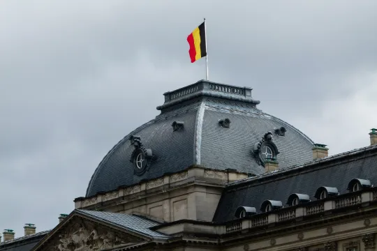 België