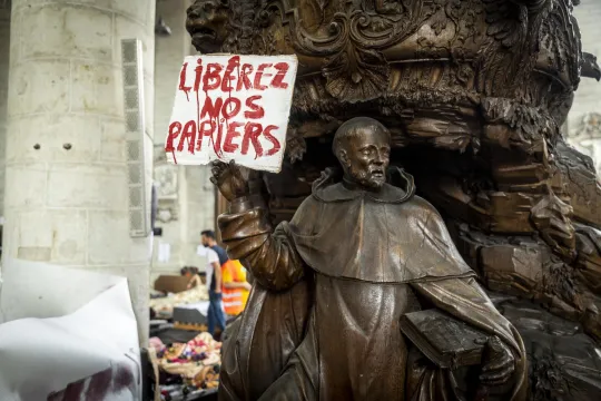 Illustration shows ac action in support of a hunger strike by people without papers occupying the Saint John the Baptist at the Beguinage - Sint-Jan Baptist ten Begijnhofkerk - Eglise Saint-Jean-Baptiste-au-Beguinage church in Brussels, Monday 19 July 2021