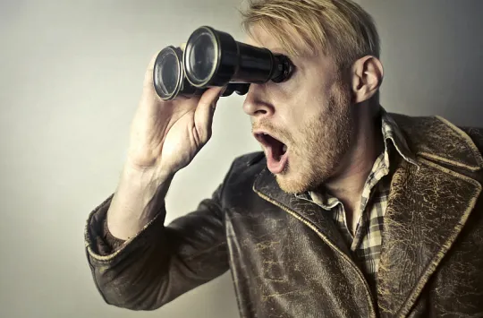 Guy with binoculars