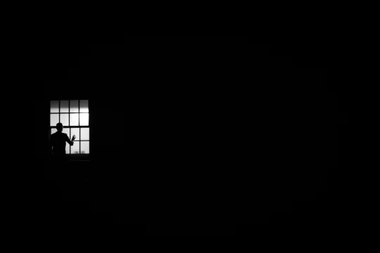 person-looking-out-the-window-3047470